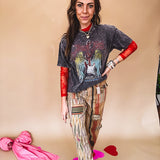 Cotton straight leg ethnic print pants in muted magenta, cream, red, blue and mustard.