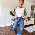 Stripe Mix Cotton Half Sleeve Top. Vibrant striping down the sleeves, exposed seams and a contrasting front and back color blocking, oversized fit and athleisure vibe.