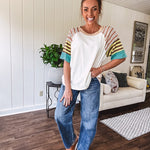 Stripe Mix Cotton Half Sleeve Top. Vibrant striping down the sleeves, exposed seams and a contrasting front and back color blocking, oversized fit and athleisure vibe.