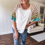 Stripe Mix Cotton Half Sleeve Top. Vibrant striping down the sleeves, exposed seams and a contrasting front and back color blocking, oversized fit and athleisure vibe.