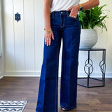 Soft comfort-stretch denim with an easy, flexible fit
Flattering mid-rise waist
Classic five-pocket design
Full-length wide-leg silhouette
Features a trouser-inspired front fold crease detail
Finished hem for a polished look
Dark wash denim