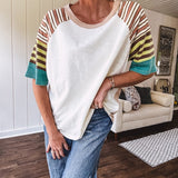 Stripe Mix Cotton Half Sleeve Top. Vibrant striping down the sleeves, exposed seams and a contrasting front and back color blocking, oversized fit and athleisure vibe.