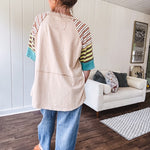 Stripe Mix Cotton Half Sleeve Top. Vibrant striping down the sleeves, exposed seams and a contrasting front and back color blocking, oversized fit and athleisure vibe.