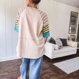 Stripe Mix Cotton Half Sleeve Top. Vibrant striping down the sleeves, exposed seams and a contrasting front and back color blocking, oversized fit and athleisure vibe.