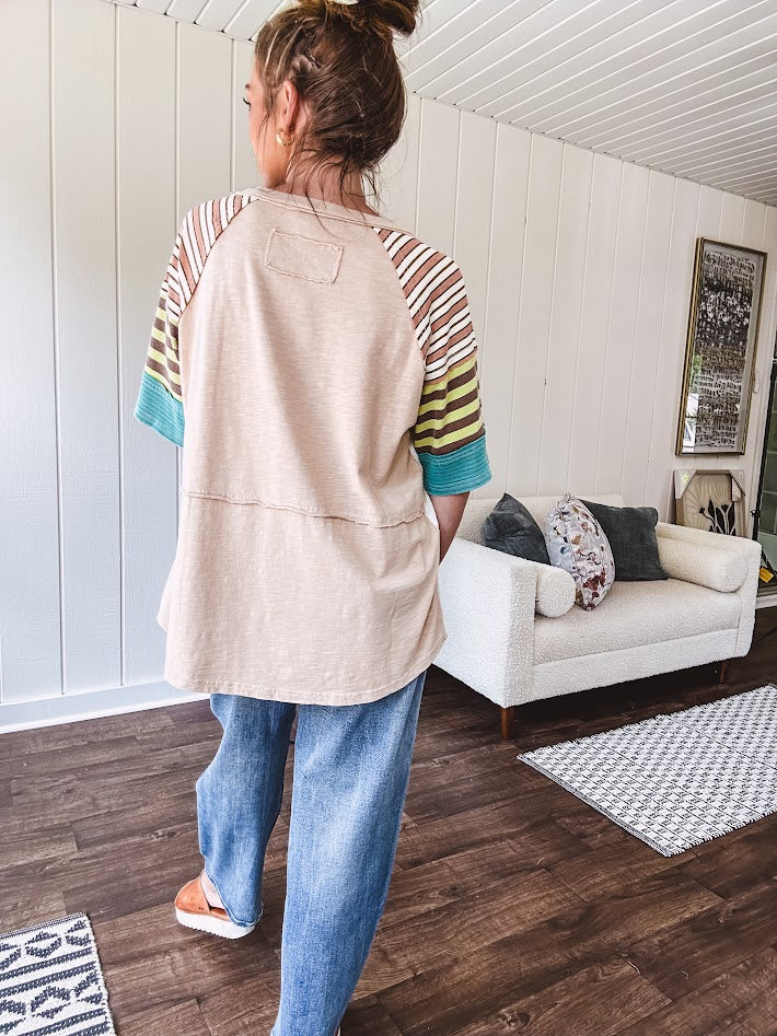 Stripe Mix Cotton Half Sleeve Top. Vibrant striping down the sleeves, exposed seams and a contrasting front and back color blocking, oversized fit and athleisure vibe.