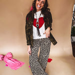 Mid rise dark taupe and black leopard print denim wide leg pants by Risen with minimal stretch.