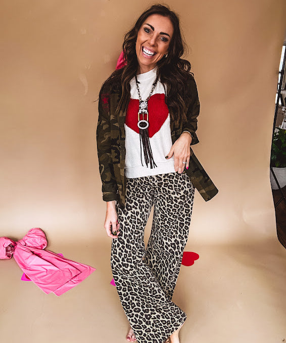 Mid rise dark taupe and black leopard print denim wide leg pants by Risen with minimal stretch.