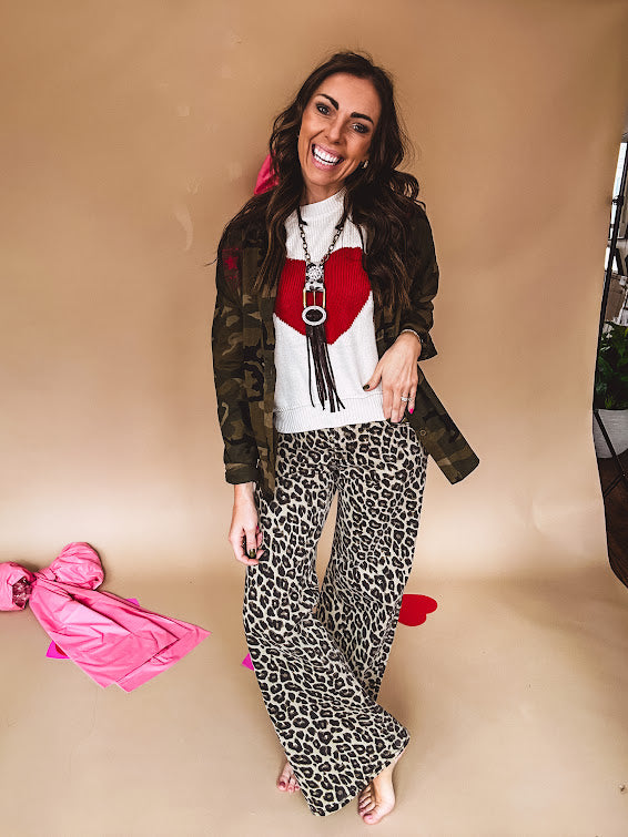 Mid rise dark taupe and black leopard print denim wide leg pants by Risen with minimal stretch.