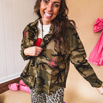 Dark green, olive and black camo jacket with button up front and red western inspired embroidery throughout.