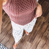 Washed cable knit sweater tank with shorter hem.