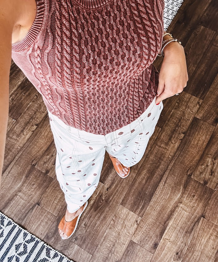 Washed cable knit sweater tank with shorter hem.