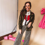 Dark green, olive and black camo jacket with button up front and red western inspired embroidery throughout.