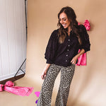 Mid rise dark taupe and black leopard print denim wide leg pants by Risen with minimal stretch.