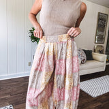Soft, ribbed mock neck sleeveless top.