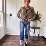 Thin, silky leopard print long blouse/dress with black button front , long sleeves, collar and shimmer detail throughout.