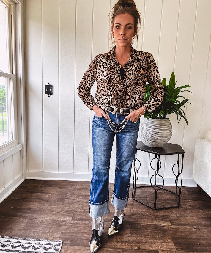 Thin, silky leopard print long blouse/dress with black button front , long sleeves, collar and shimmer detail throughout.