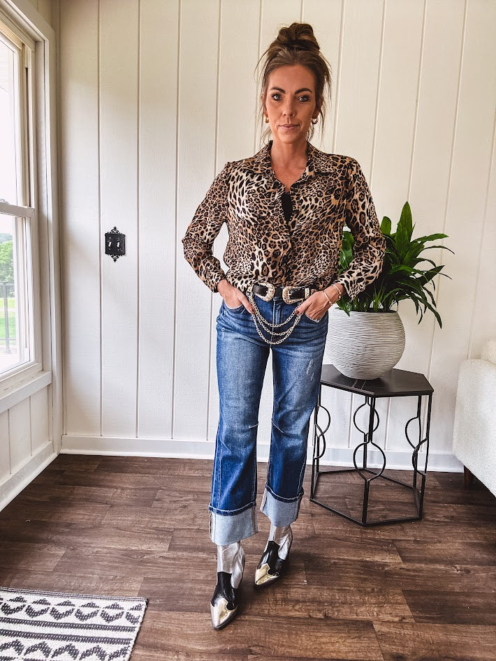 Thin, silky leopard print long blouse/dress with black button front , long sleeves, collar and shimmer detail throughout.