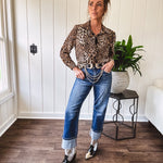 Thin, silky leopard print long blouse/dress with black button front , long sleeves, collar and shimmer detail throughout.