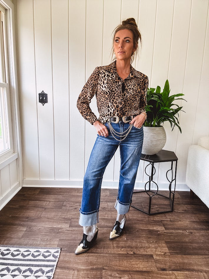 Thin, silky leopard print long blouse/dress with black button front , long sleeves, collar and shimmer detail throughout.