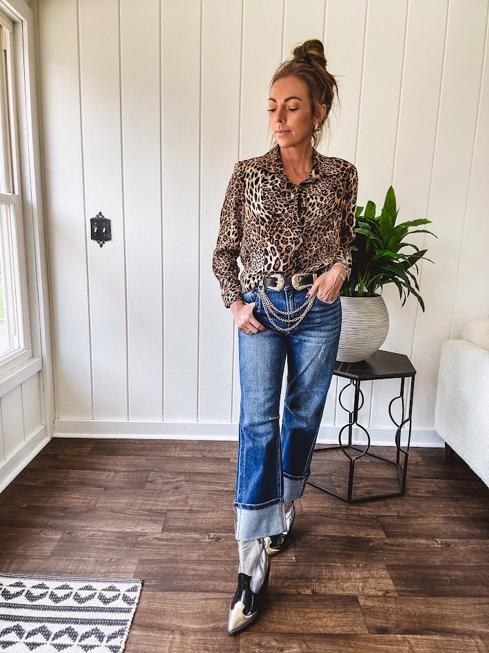 Thin, silky leopard print long blouse/dress with black button front , long sleeves, collar and shimmer detail throughout.