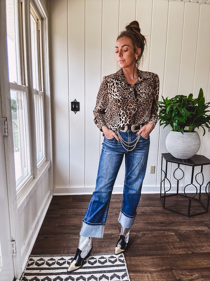 Thin, silky leopard print long blouse/dress with black button front , long sleeves, collar and shimmer detail throughout.