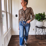 Thin, silky leopard print long blouse/dress with black button front , long sleeves, collar and shimmer detail throughout.