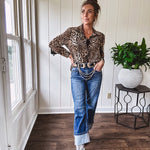 Thin, silky leopard print long blouse/dress with black button front , long sleeves, collar and shimmer detail throughout.