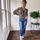 Thin, silky leopard print long blouse/dress with black button front , long sleeves, collar and shimmer detail throughout.