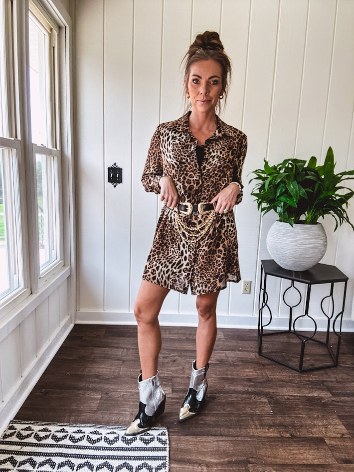 Thin, silky leopard print long blouse/dress with black button front , long sleeves, collar and shimmer detail throughout.