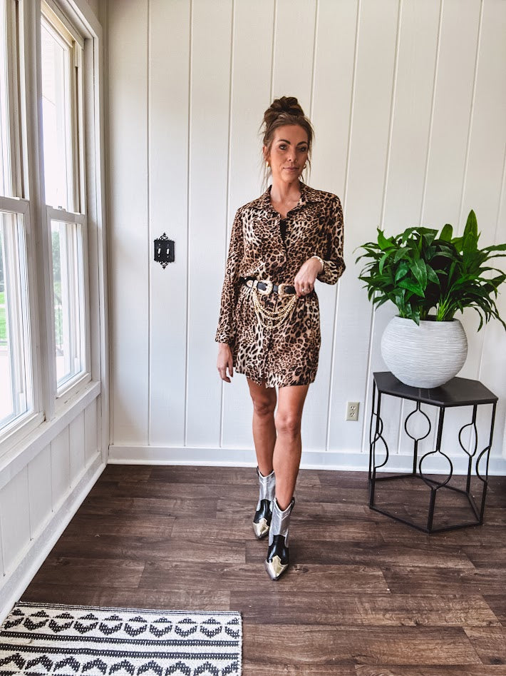 Thin, silky leopard print long blouse/dress with black button front , long sleeves, collar and shimmer detail throughout.