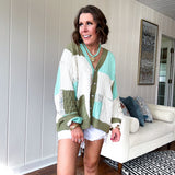 Woven knit button down cardigan with color block patchwork in either mint and green or yellow and taupe.