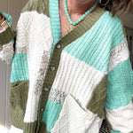 Woven knit button down cardigan with color block patchwork in either mint and green or yellow and taupe.