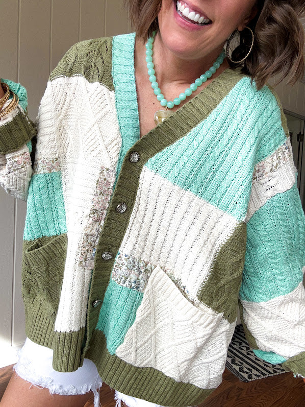 Woven knit button down cardigan with color block patchwork in either mint and green or yellow and taupe.