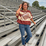 Red brown and cream striped sweatshirt with oversized dolman cut, short sleeves and a gingham football applique trimmed in cream lace.