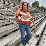 Red brown and cream striped sweatshirt with oversized dolman cut, short sleeves and a gingham football applique trimmed in cream lace.