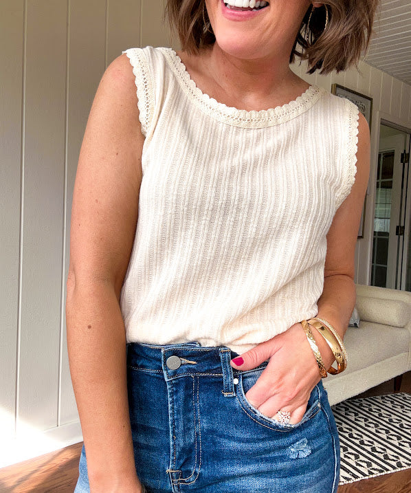 Ribbed textured tank with eyelet crocheted trim. Available in many colors