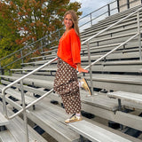Slick brown with white polka dots balloon style pants with extra volume in the legs and elastic waist.