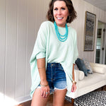 Oversized dolman 3/4 sleeve top with waffle texture.