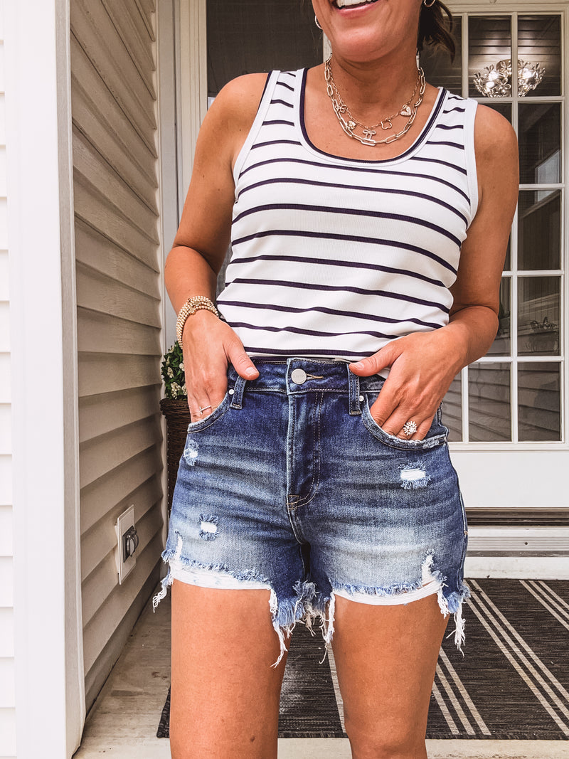 Medium Wash High Rise Distressed Shorts