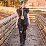Black Puffer Vest with Shoulder Ruffle Detail