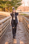 Black Puffer Vest with Shoulder Ruffle Detail
