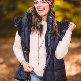 Black Puffer Vest with Shoulder Ruffle Detail