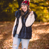 Black Puffer Vest with Shoulder Ruffle Detail