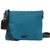 Consuela slate blue suede crossbody with copper flecks, an adjustable strap two inside pockets with a zipper closure, an interior slide pocket, credit card slots, and a removable studded black leather strap