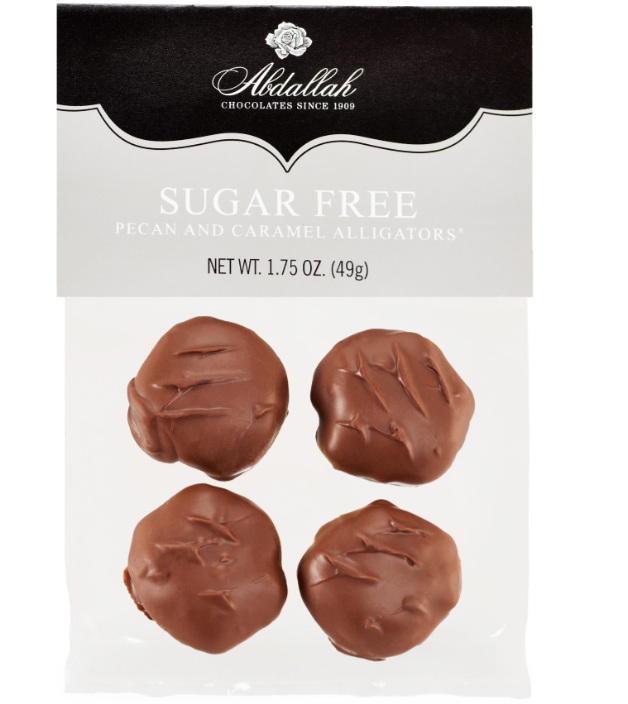4 pieces of sugar free milk chocolate, caramel and pecan candies.