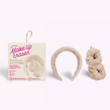 Set of two cream plush wrist bands and a matching plus headband