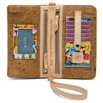 Consuela uptown crossbody in brown suede with metallic flecks, multi colored braided strap and leather wristlet.