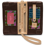 Chocolate-toned glitter Consuela wallet with two zippered compartments, an exterior pocket, six card slots, and an ID window with double magnetic closure,  included adjustable woven strap for crossbody carry or a detachable wristlet