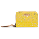 Consuela small wallet in bright yellow Consuela cloth with silver stars throughout and zipper closure.