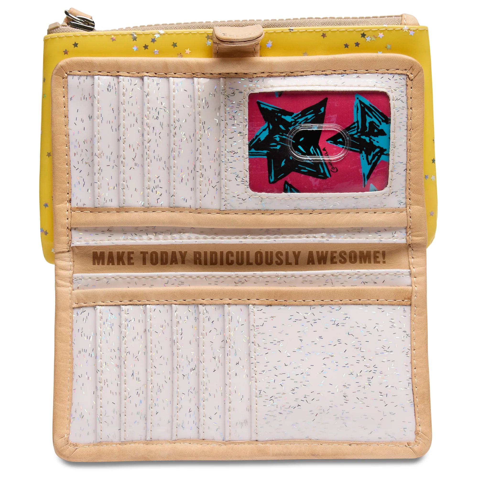 Consuela slim wallet in bright yellow with silver stars throughout and a white interior.